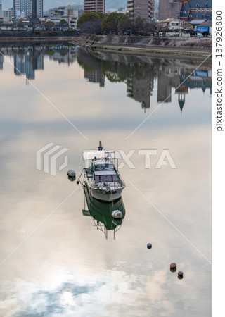A riverside scene in Hiroshima City: Boats moored on the Ota River. A riverside scene in Hiroshima City: Boats moored on the Ota River. 137926800