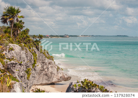 Tulum coastline overlooking the turquoise Caribbean Sea and waves breaking on the white sandy beach. 137928074
