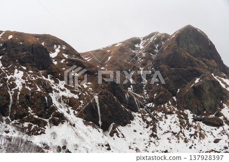 A view of snow-covered Momoiwa Rock from Momoiwa Observatory on Rebun Island in winter. 137928397