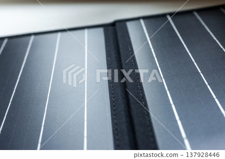 Close-up of a foldable portable solar panel Close-up of a foldable portable solar panel 137928446