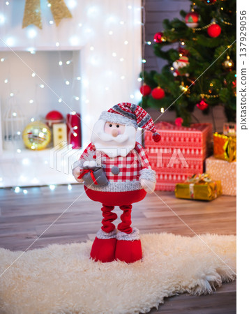 Santa Claus toy on Christmas decorations. Santa Claus toy on Christmas decorations. 137929056
