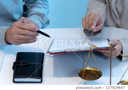 close up shot of lawyer and business people are discussing business legal close up shot of lawyer and business people are discussing business legal 137929647
