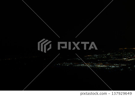 The night view of Haneda Airport and the scenery of Tokyo Bay as seen from an airplane. The night view of Haneda Airport and the scenery of Tokyo Bay as seen from an airplane. 137929649