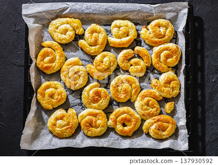Greek cheese sarikopita spiral pies, top view Greek cheese sarikopita spiral pies, top view 137930592