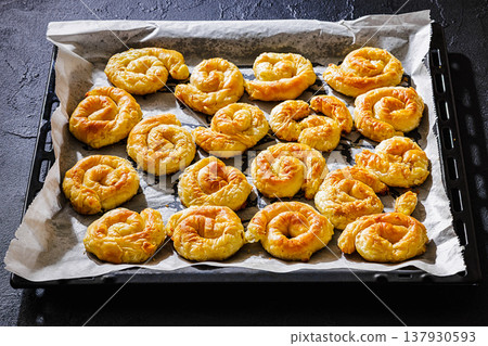 Greek cheese sarikopita spiral pies, top view Greek cheese sarikopita spiral pies, top view 137930593