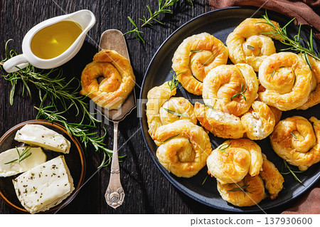 Greek cheese sarikopita spiral pies, top view Greek cheese sarikopita spiral pies, top view 137930600