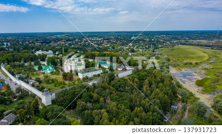Bird's eye view of an old church in a village on a beautiful summer day. Picture from above an ancient church during day time Bird's eye view of an old church in a village on a beautiful summer day. Picture from above an ancient church during day time 137931723