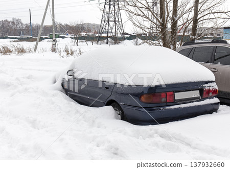 cars under the snow, winter 137932660
