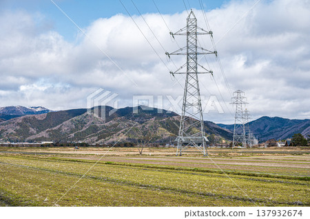 A steel tower standing in the middle of a rice field, Makino-cho, Takashima City, Shiga Prefecture 137932674
