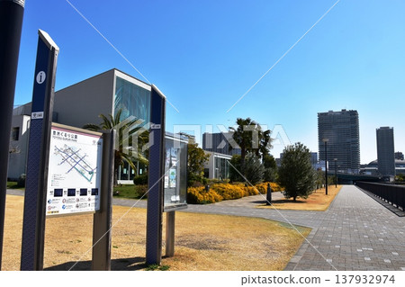 Toyosu Gururi Park information board, walking paths, and park restaurant in Koto Ward, Tokyo. Toyosu Gururi Park information board, walking paths, and park restaurant in Koto Ward, Tokyo. 137932974
