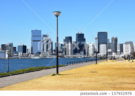 Toyosu Gururi Park walking path and high-rise buildings in Koto Ward, Tokyo Toyosu Gururi Park walking path and high-rise buildings in Koto Ward, Tokyo 137932976