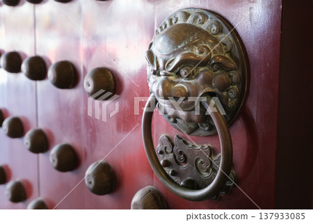 Buddha Tooth Relic Temple door detail in Chinatown, vibrant architecture highlights cultural heritage in Singapore 137933085