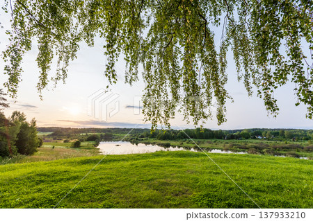Golden sunset lights a tranquil Sorot river valley 137933210
