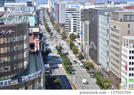 Ohakudori Street, in front of JR Hakata Station. You can see Hakata Bay and Shikanoshima Island. Photographed from the rooftop of the JR Hakata Station building. Ohakudori Street, in front of JR Hakata Station. You can see Hakata Bay and Shikanoshima Island. Photographed from the rooftop of the JR Hakata Station building. 137935704