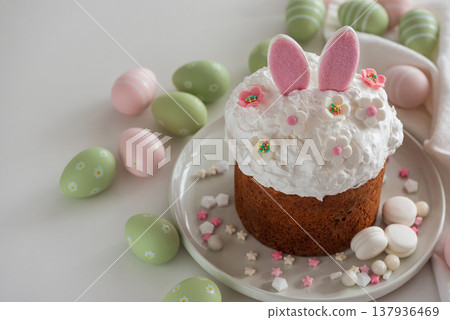 Easter Cake with Bunny Ears and Easter Eggs. Festive Spring Composition 137936469