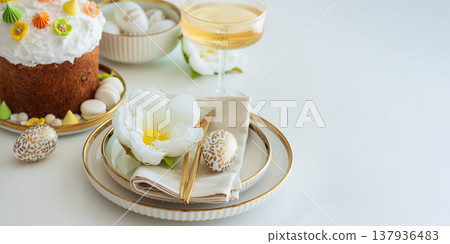 Elegant Easter Table Setting with Decorative Egg and Spring Details 137936483