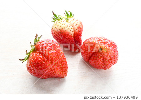 Imperfect strawberries Imperfect strawberries 137936499