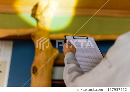 Clipboard of the inspecting worker Clipboard of the inspecting worker 137937332