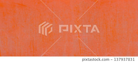 Orange surface showing weathered paint and abstract texture 137937831