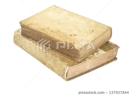 Stacked old antique books with weathered parchment pages 137937844