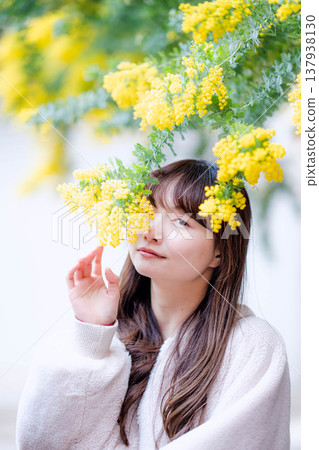 Mimosa and young woman Mimosa and young woman 137938130