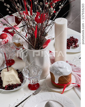 Creative arrangement featuring glassware and textured frosting details 137938283