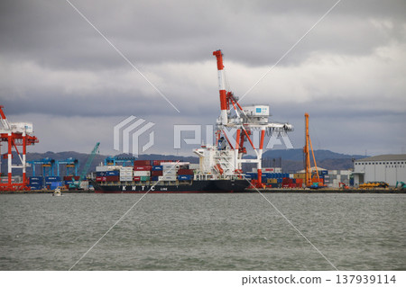 Large container ship docked at container terminal Large container ship docked at container terminal 137939114