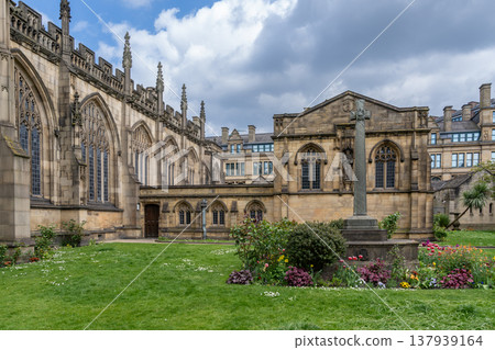 Manchester Cathedral Gardens with Blue Sky and White Clouds Manchester Cathedral Gardens with Blue Sky and White Clouds 137939164
