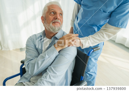 Help support retirement healthcare. Nurse helping old man in wheelchair. Patient and woman in nursing home for medical caregiver. Nurse taking care of paralyzed man in chair for people with disability 137939800