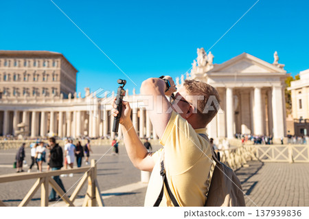 Tourist photographing architecture at St Peter Square Vatican 137939836