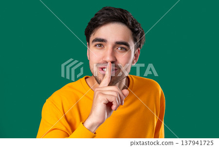 Handsome Man With Gesture Of Shhh, Secret, Silence, Conspiracy, Quiet, Rumors 137941725