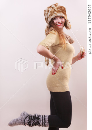 Beautiful winter woman in warm clothing 137942695