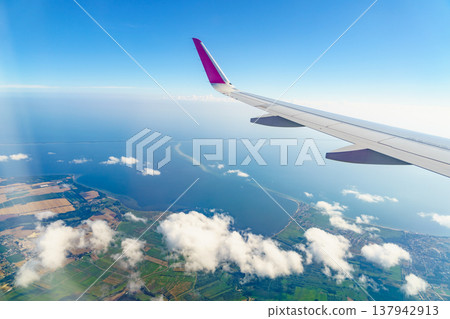 View from an airplane window to Baltic Sea 137942913