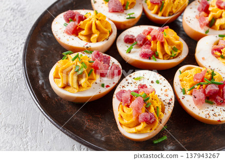 Spicy, stuffed ramen eggs, with bacon and green onions, homemade, no people, 137943267