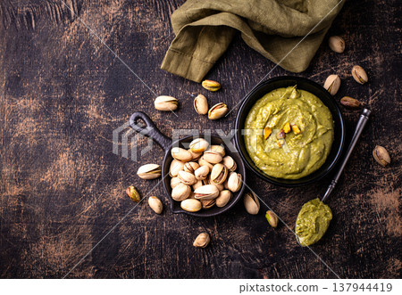 Sweet pistachio cream in a bowl Sweet pistachio cream in a bowl 137944419