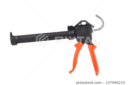 Professional caulking gun with orange handle isolated on white background. Silicone sealant applicator tool Professional caulking gun with orange handle isolated on white background. Silicone sealant applicator tool 137946233
