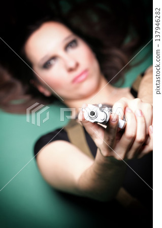 Sexy young woman long hair - gun 137946282