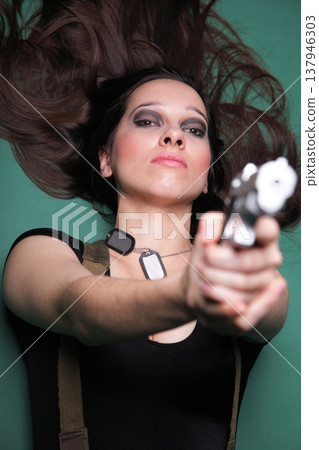 Sexy young woman long hair - gun 137946303