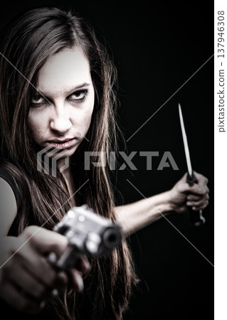 Sexy young woman long hair - gun knife Sexy young woman long hair - gun knife 137946308