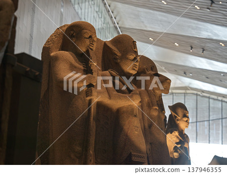A group sculpture depicting the gods and kings of ancient Egypt. A group sculpture depicting the gods and kings of ancient Egypt. 137946355