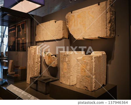 A collection of ancient Egyptian stone fragments inscribed with hieroglyphs A collection of ancient Egyptian stone fragments inscribed with hieroglyphs 137946364