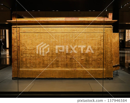 Side of a gilded sarcophagus completely inscribed with hieroglyphs, from Tutankhamun's tomb. Side of a gilded sarcophagus completely inscribed with hieroglyphs, from Tutankhamun's tomb. 137946384