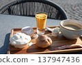Flemish indulgent coffee set on sunny terrace Flemish indulgent coffee set on sunny terrace 137947436