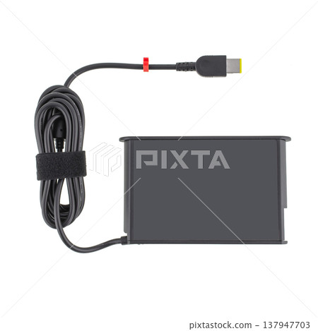 laptop power adapter, laptop spare part, isolated on white background 137947703