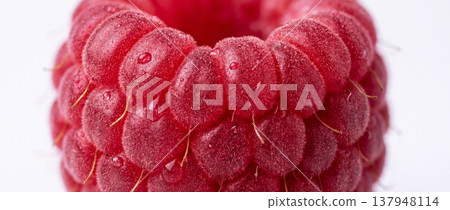 Close-up of a ripe raspberry isolated on a white background 137948114