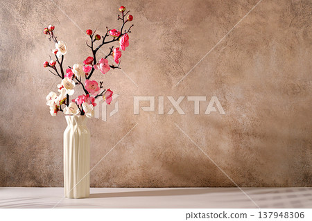 Abstract spring floral arrangement with pink cherry blossom branches in a vase, elegant sunny colorful banner and template for your creative work, display table or spring beauty concept, 137948306