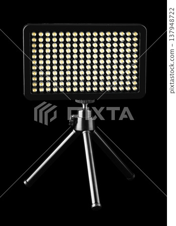flashlight searchlight for video filming, on a black background flashlight searchlight for video filming, on a black background 137948722