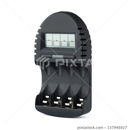 charger for finger-type batteries, charging for four batteries, on a white background 137948927