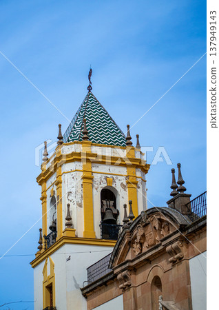 Walking along ancient streets enjoying historic architecture and charming atmosphere in Ronda, Spain. Walking along ancient streets enjoying historic architecture and charming atmosphere in Ronda, Spain. 137949143