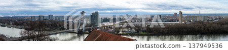 Panoramic view on Danube river and right side of Bratislava from Bratislava Castle Panoramic view on Danube river and right side of Bratislava from Bratislava Castle 137949536
